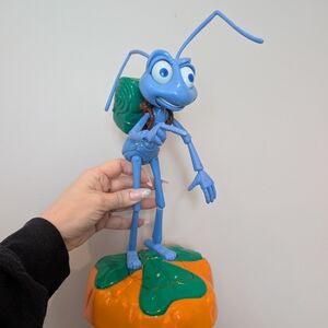 Blue Ant Figure on Orange Leaf Base